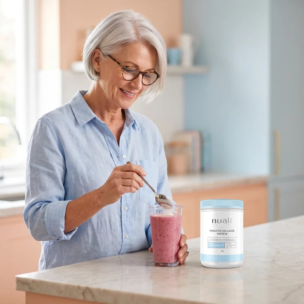 Woman stirring collagen into a smoothie