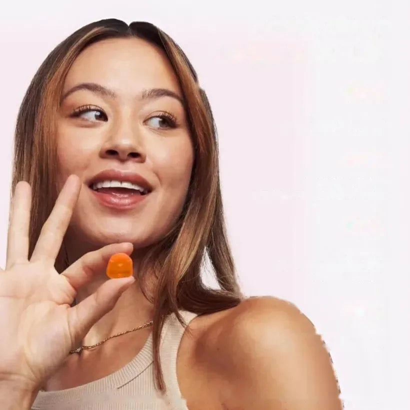 Woman eating a gummy